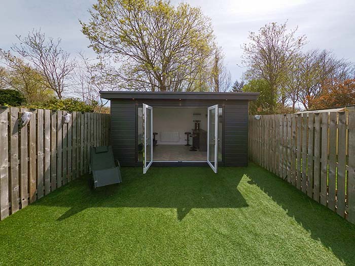 Finished garden room with sliding doors built in Aberdeen