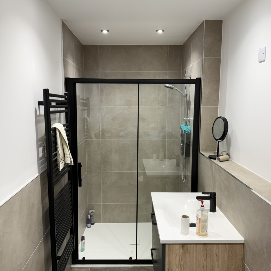 New bathroom fitted by Granite Builders in Inverbervie with shower enclosure and vanity