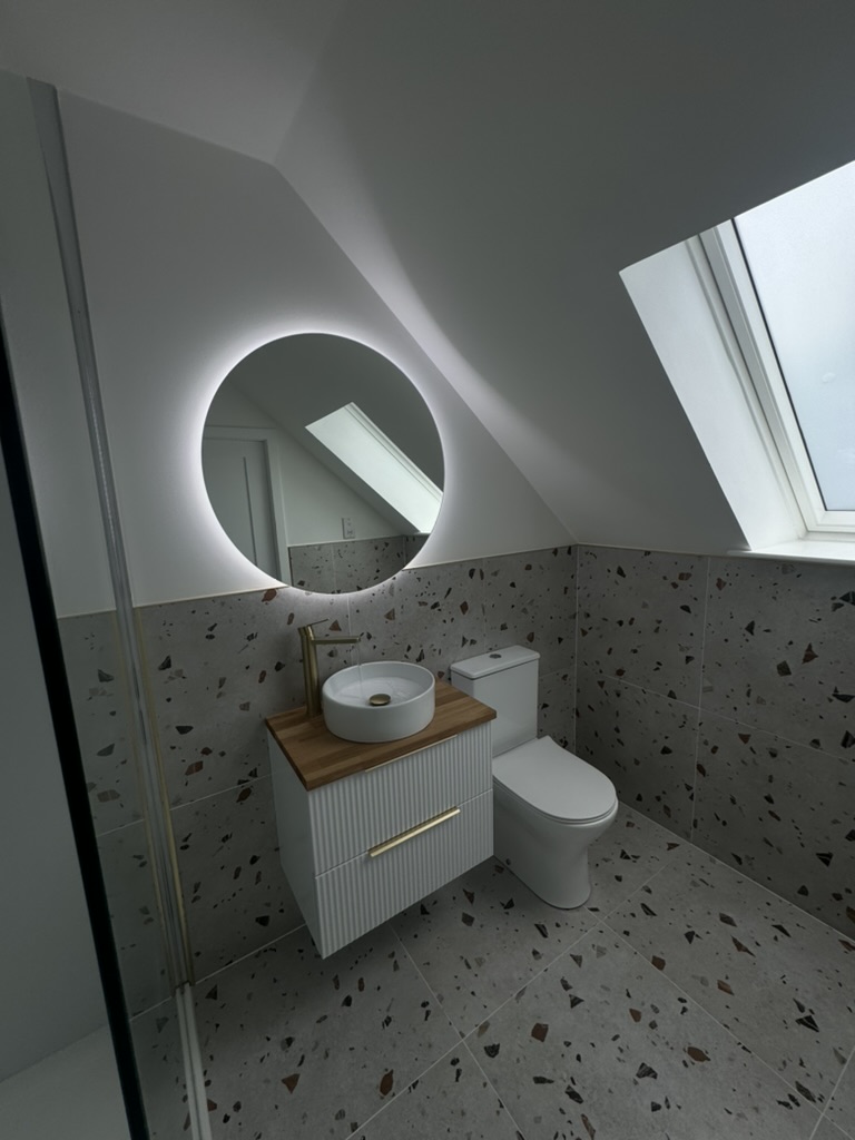 Terrazzo tiled en-suite bathroom in Portlethen