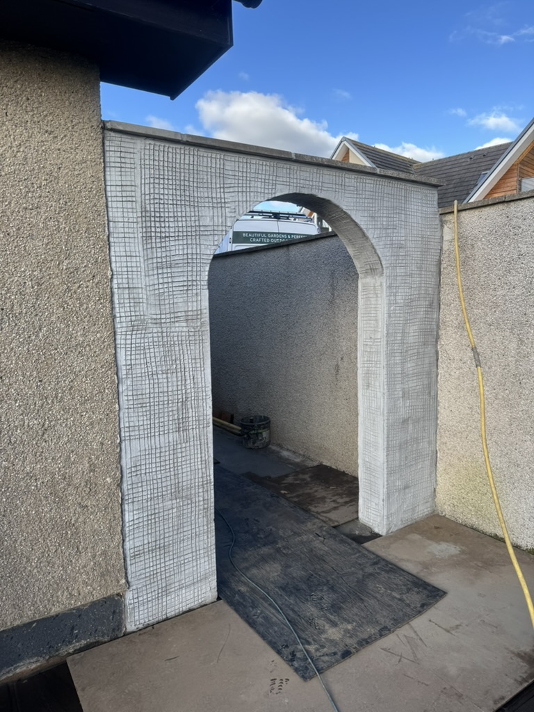 External masonry archway with a textured finish in Aberdeen