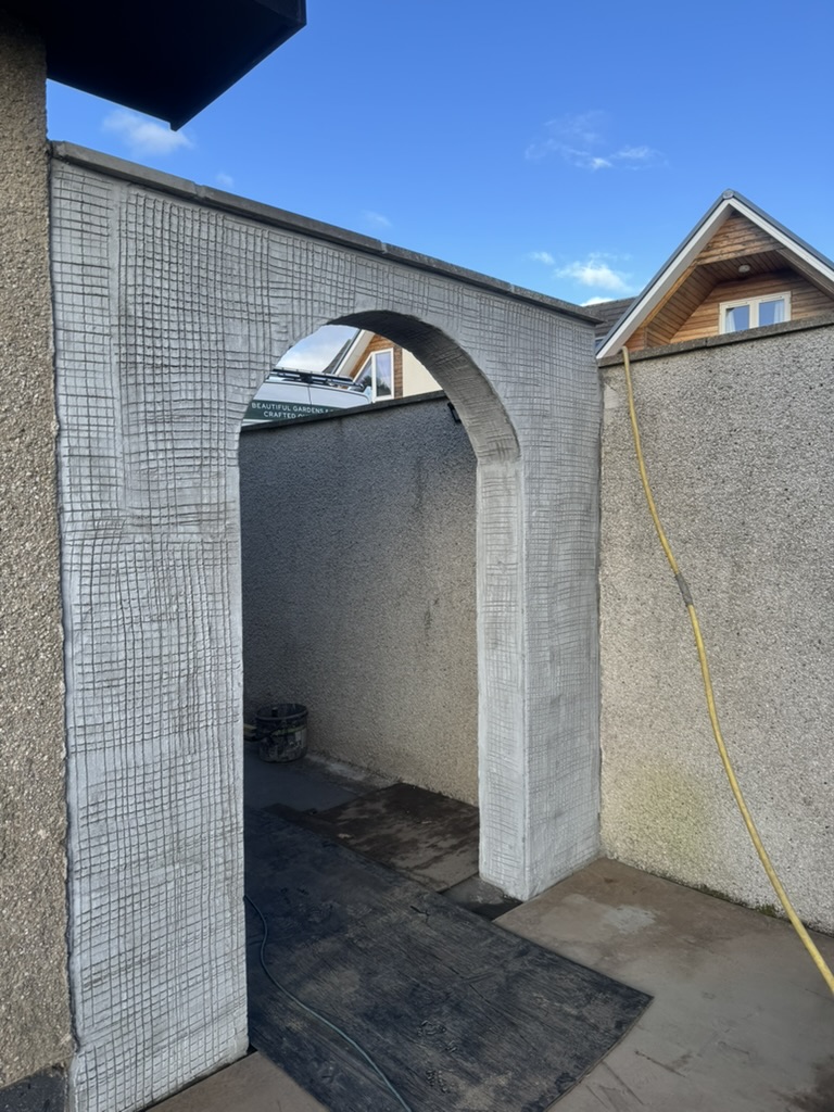 Textured render finish on an external archway in Aberdeen