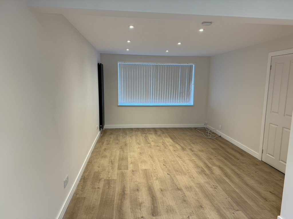 Aberdeen living room after a full renovation, replastered walls, new engineered wood flooring, fresh paint
