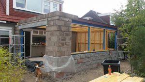 Blockwork walls of a single-storey extension in progress on an Aberdeen home