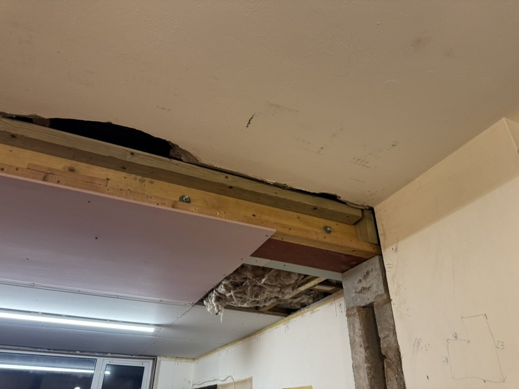 Structural steel beam supporting the ceiling after a wall has been removed on an Aberdeen renovation